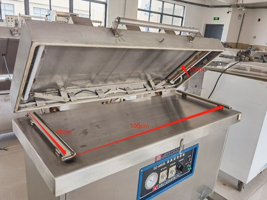 Large Work Table Dz400 Single Chamber Brick Vacuum Packing Machine for Rice and Fish